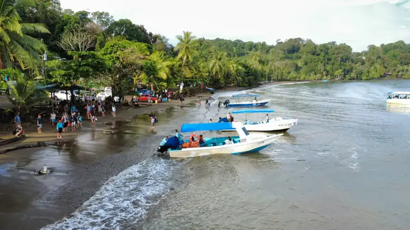 Boats landing on the beach at Drake Bay